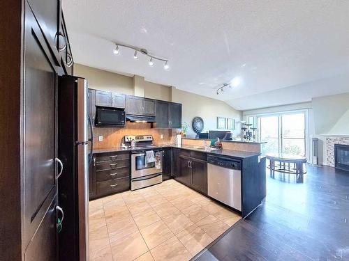 303-2012 1 Street Nw, Calgary, AB - Indoor Photo Showing Kitchen With Stainless Steel Kitchen With Upgraded Kitchen