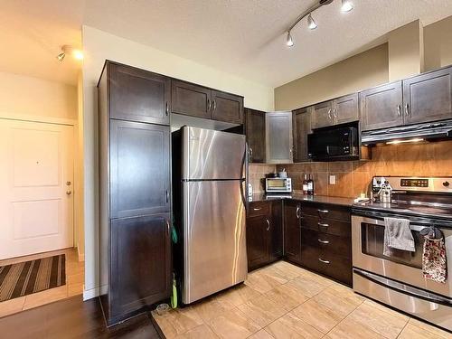 303-2012 1 Street Nw, Calgary, AB - Indoor Photo Showing Kitchen With Stainless Steel Kitchen