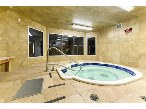 101-52 Cranfield Link Se, Calgary, AB - Indoor Photo Showing Other Room With In Ground Pool