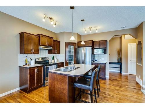 73 Cranwell Green Se, Calgary, AB - Indoor Photo Showing Kitchen With Double Sink