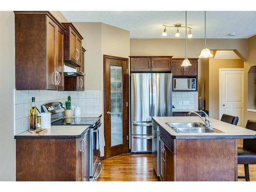 73 Cranwell Green Se, Calgary, AB - Indoor Photo Showing Kitchen With Double Sink