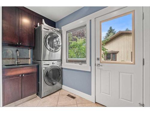 60 Deerbrook Crescent Se, Calgary, AB - Indoor Photo Showing Laundry Room