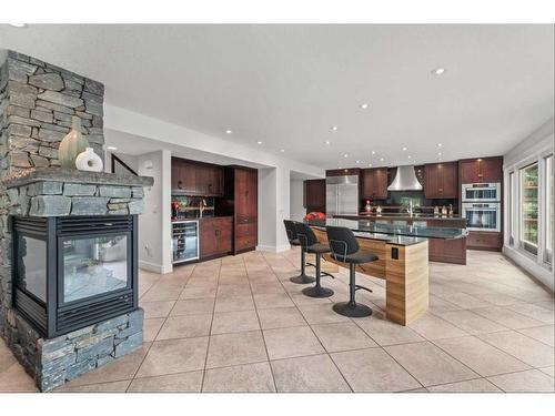 60 Deerbrook Crescent Se, Calgary, AB - Indoor With Fireplace