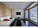 82 Douglasbank Way Se, Calgary, AB  - Indoor Photo Showing Living Room 