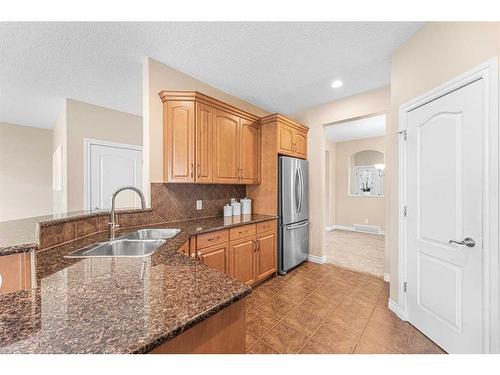 133 Saddleland Close Ne, Calgary, AB - Indoor Photo Showing Kitchen With Double Sink