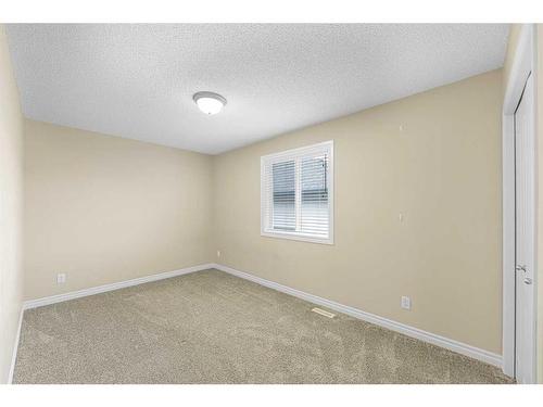 133 Saddleland Close Ne, Calgary, AB - Indoor Photo Showing Other Room