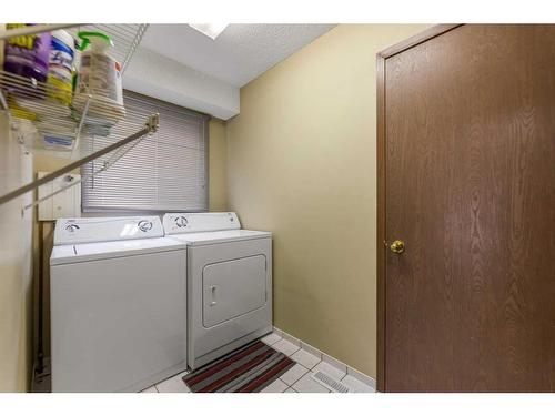 67 Tararidge Place Ne, Calgary, AB - Indoor Photo Showing Laundry Room