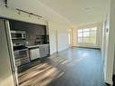 404-25 Auburn Meadows Avenue Se, Calgary, AB  - Indoor Photo Showing Kitchen With Stainless Steel Kitchen 