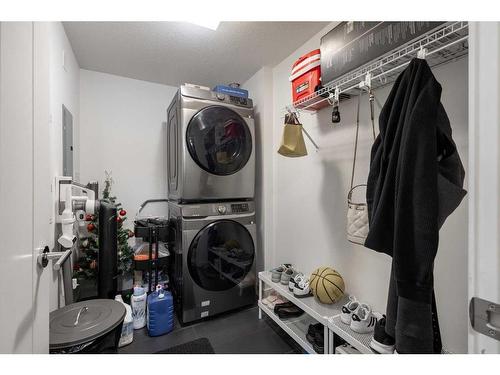 101-15 Aspenmont Heights Sw, Calgary, AB - Indoor Photo Showing Laundry Room