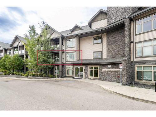 101-15 Aspenmont Heights Sw, Calgary, AB - Outdoor With Balcony With Facade