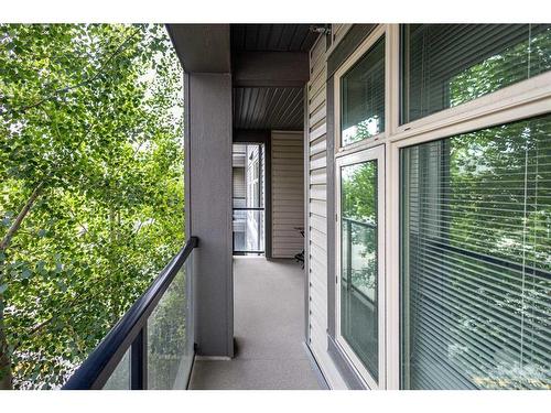 101-15 Aspenmont Heights Sw, Calgary, AB - Outdoor With Balcony With Exterior