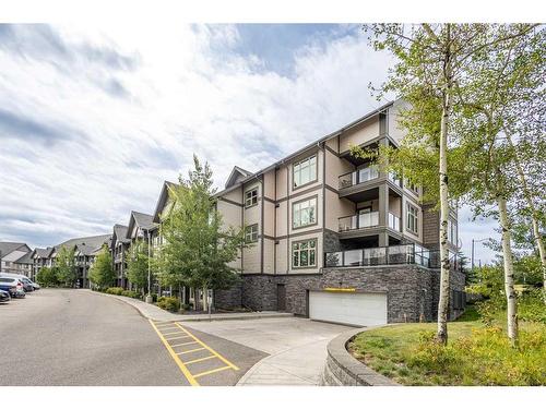 101-15 Aspenmont Heights Sw, Calgary, AB - Outdoor With Balcony With Facade