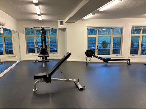 101-15 Aspenmont Heights Sw, Calgary, AB - Indoor Photo Showing Gym Room