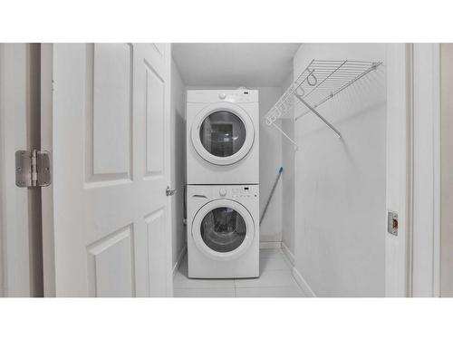 81 Nolanhurst Crescent Nw, Calgary, AB - Indoor Photo Showing Laundry Room