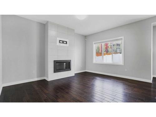 81 Nolanhurst Crescent Nw, Calgary, AB - Indoor Photo Showing Living Room With Fireplace