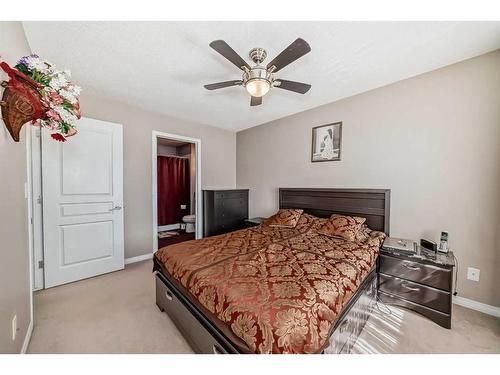 144 Everridge Gardens Sw, Calgary, AB - Indoor Photo Showing Bedroom