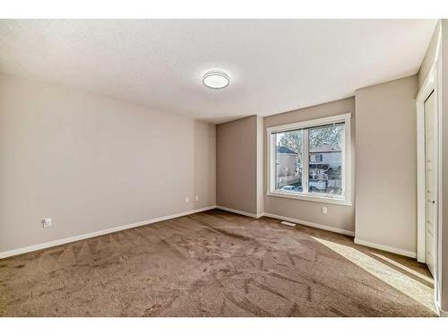 1608-7451 Falconridge Boulevard Ne, Calgary, AB - Indoor Photo Showing Other Room