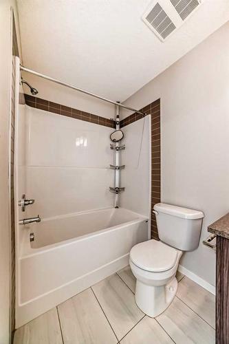 1608-7451 Falconridge Boulevard Ne, Calgary, AB - Indoor Photo Showing Bathroom