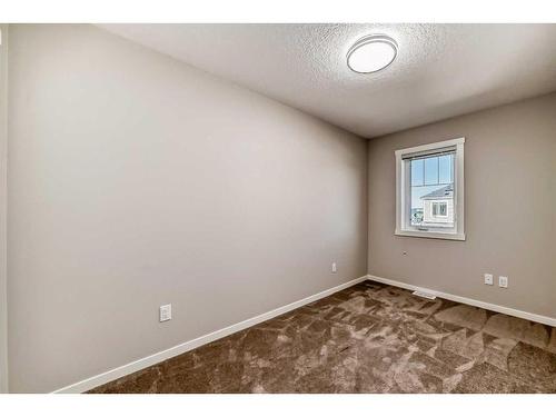 1608-7451 Falconridge Boulevard Ne, Calgary, AB - Indoor Photo Showing Other Room