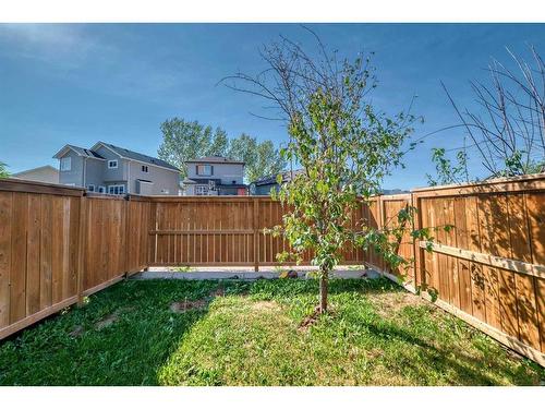 1608-7451 Falconridge Boulevard Ne, Calgary, AB - Outdoor With Backyard