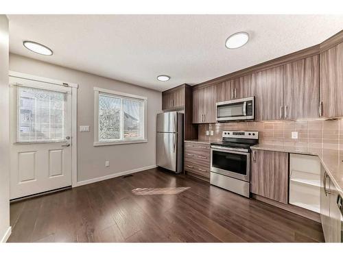 1608-7451 Falconridge Boulevard Ne, Calgary, AB - Indoor Photo Showing Kitchen