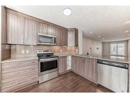 1608-7451 Falconridge Boulevard Ne, Calgary, AB - Indoor Photo Showing Kitchen