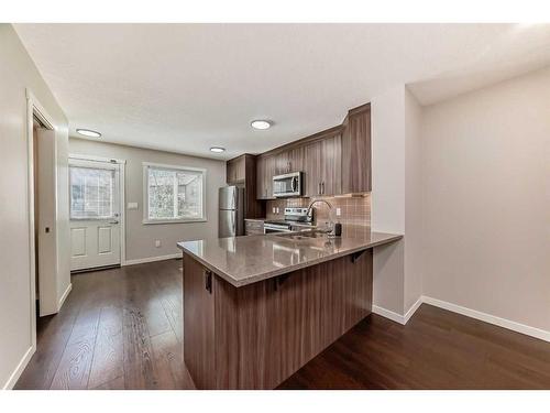 1608-7451 Falconridge Boulevard Ne, Calgary, AB - Indoor Photo Showing Kitchen