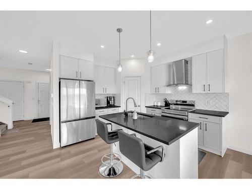 1021 Waterford Drive, Chestermere, AB - Indoor Photo Showing Kitchen With Stainless Steel Kitchen With Upgraded Kitchen