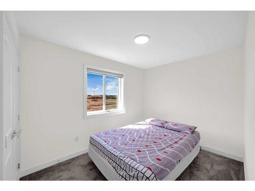 1021 Waterford Drive, Chestermere, AB - Indoor Photo Showing Bedroom