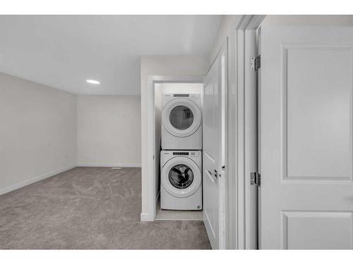 1021 Waterford Drive, Chestermere, AB - Indoor Photo Showing Laundry Room