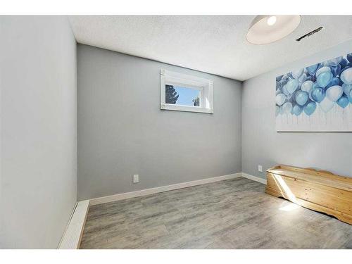 1906 Olympia Drive Se, Calgary, AB - Indoor Photo Showing Other Room