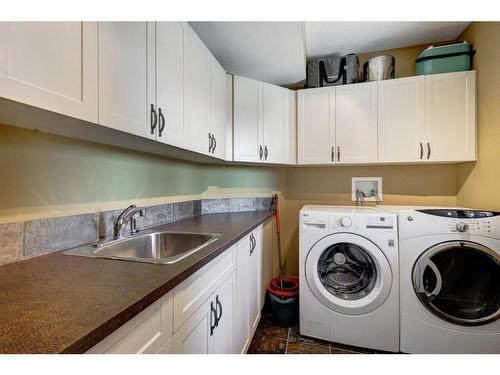 100-370025 288 Street West, Rural Foothills County, AB - Indoor Photo Showing Laundry Room