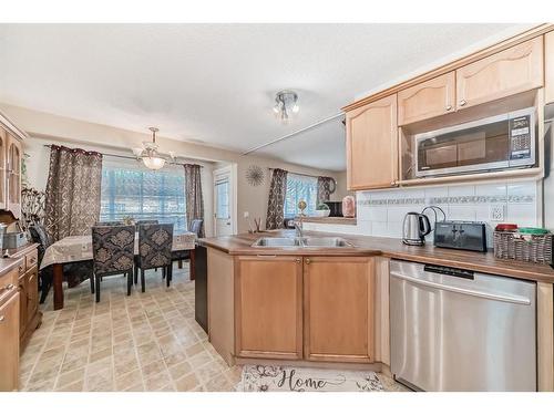 241 Covewood Circle Ne, Calgary, AB - Indoor Photo Showing Kitchen With Double Sink