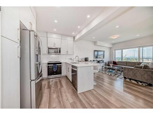 116 Crestridge Common Sw, Calgary, AB - Indoor Photo Showing Kitchen With Stainless Steel Kitchen With Upgraded Kitchen