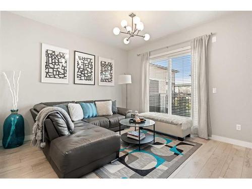 129-30 Cornerstone Manor Ne, Calgary, AB - Indoor Photo Showing Living Room