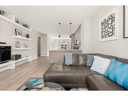 129-30 Cornerstone Manor Ne, Calgary, AB - Indoor Photo Showing Living Room