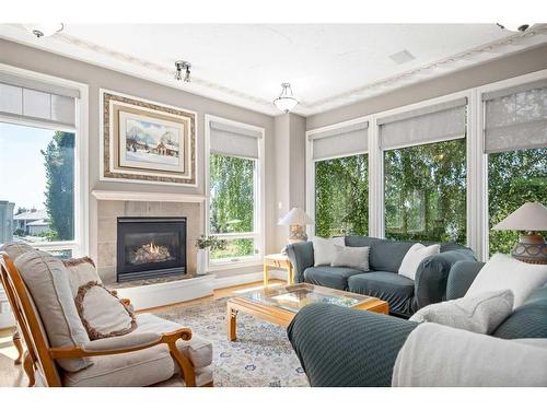 76 Sierra Vista Close Sw, Calgary, AB - Indoor Photo Showing Living Room With Fireplace