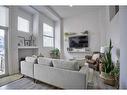 105 Auburn Bay Circle Se, Calgary, AB  - Indoor Photo Showing Living Room 