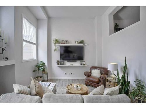 105 Auburn Bay Circle Se, Calgary, AB - Indoor Photo Showing Living Room