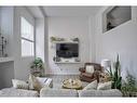 105 Auburn Bay Circle Se, Calgary, AB  - Indoor Photo Showing Living Room 