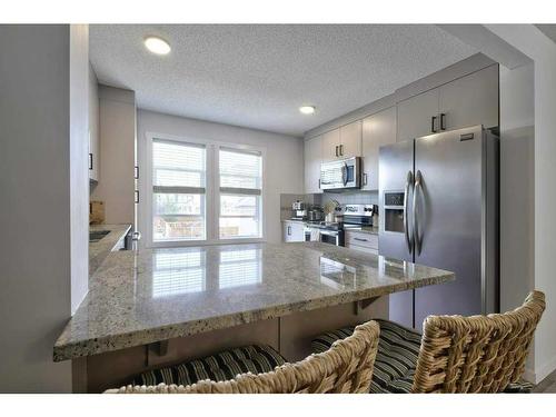 105 Auburn Bay Circle Se, Calgary, AB - Indoor Photo Showing Kitchen With Stainless Steel Kitchen