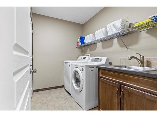 1218 Kingston Crescent Se, Airdrie, AB - Indoor Photo Showing Laundry Room