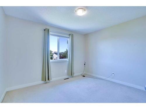 108 Rainbow Falls Grove, Chestermere, AB - Indoor Photo Showing Other Room