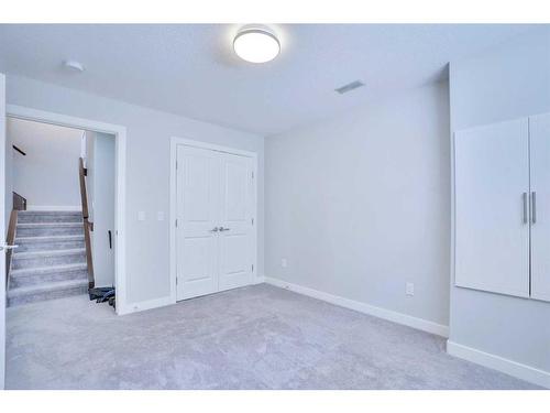 108 Rainbow Falls Grove, Chestermere, AB - Indoor Photo Showing Other Room