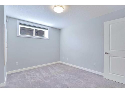 108 Rainbow Falls Grove, Chestermere, AB - Indoor Photo Showing Other Room