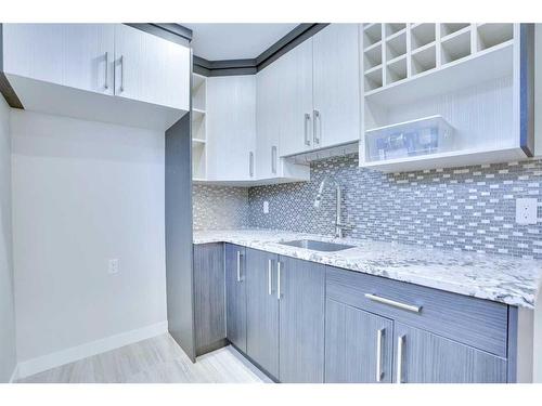 108 Rainbow Falls Grove, Chestermere, AB - Indoor Photo Showing Kitchen