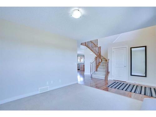 108 Rainbow Falls Grove, Chestermere, AB - Indoor Photo Showing Other Room