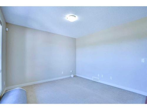 108 Rainbow Falls Grove, Chestermere, AB - Indoor Photo Showing Other Room