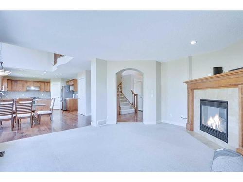 108 Rainbow Falls Grove, Chestermere, AB - Indoor Photo Showing Living Room With Fireplace