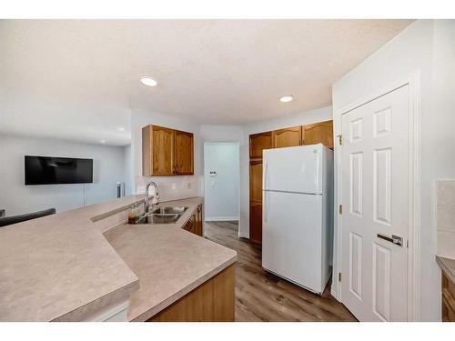 158 Coville Circle Ne, Calgary, AB - Indoor Photo Showing Kitchen With Double Sink